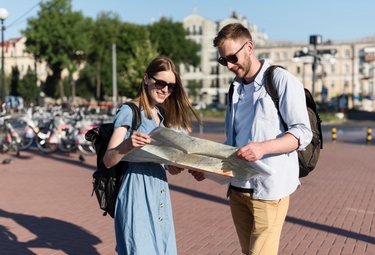 Public_thumb_tourist-couple-holding-map-together